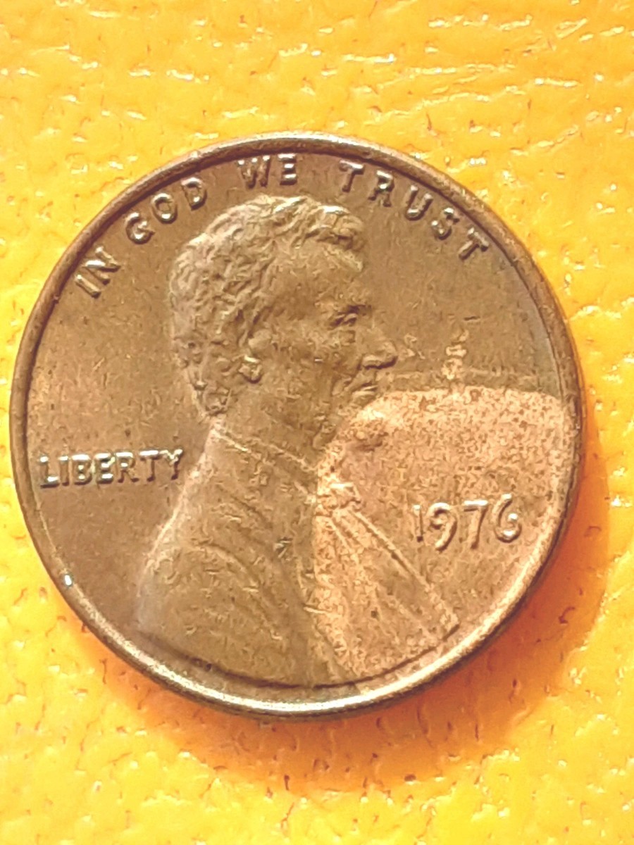 1976 penny BIE die break error showing raised letter I between B and E in LIBERTY inscription